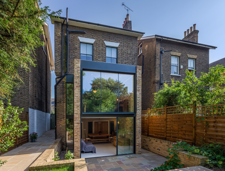 This image depicts the view from the garden to the house of the Handen Road project.