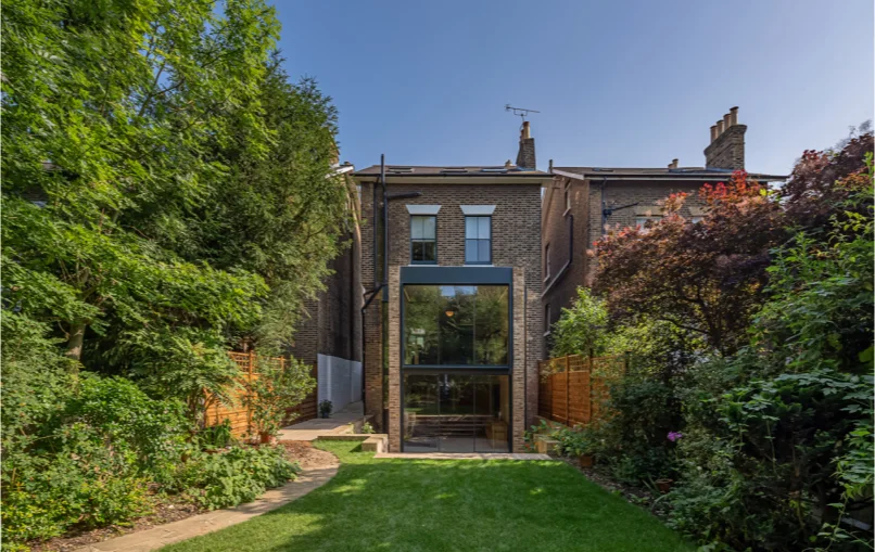 This image depicts the garden view towards the house.