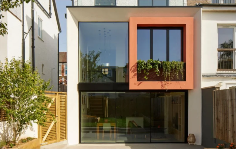 This image depicts the Cube House project from the garden view.